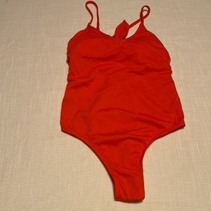 NEW. One piece swimwear
